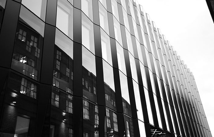 Office building reflecting residential property